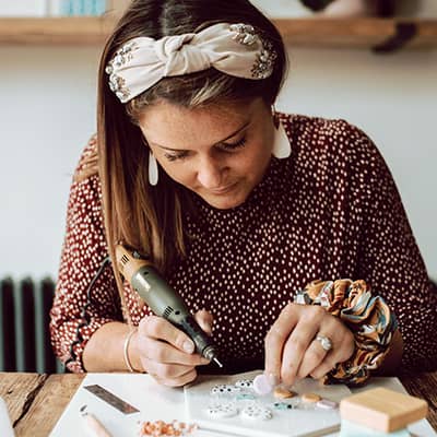 Melissa creating polymer clay earrings