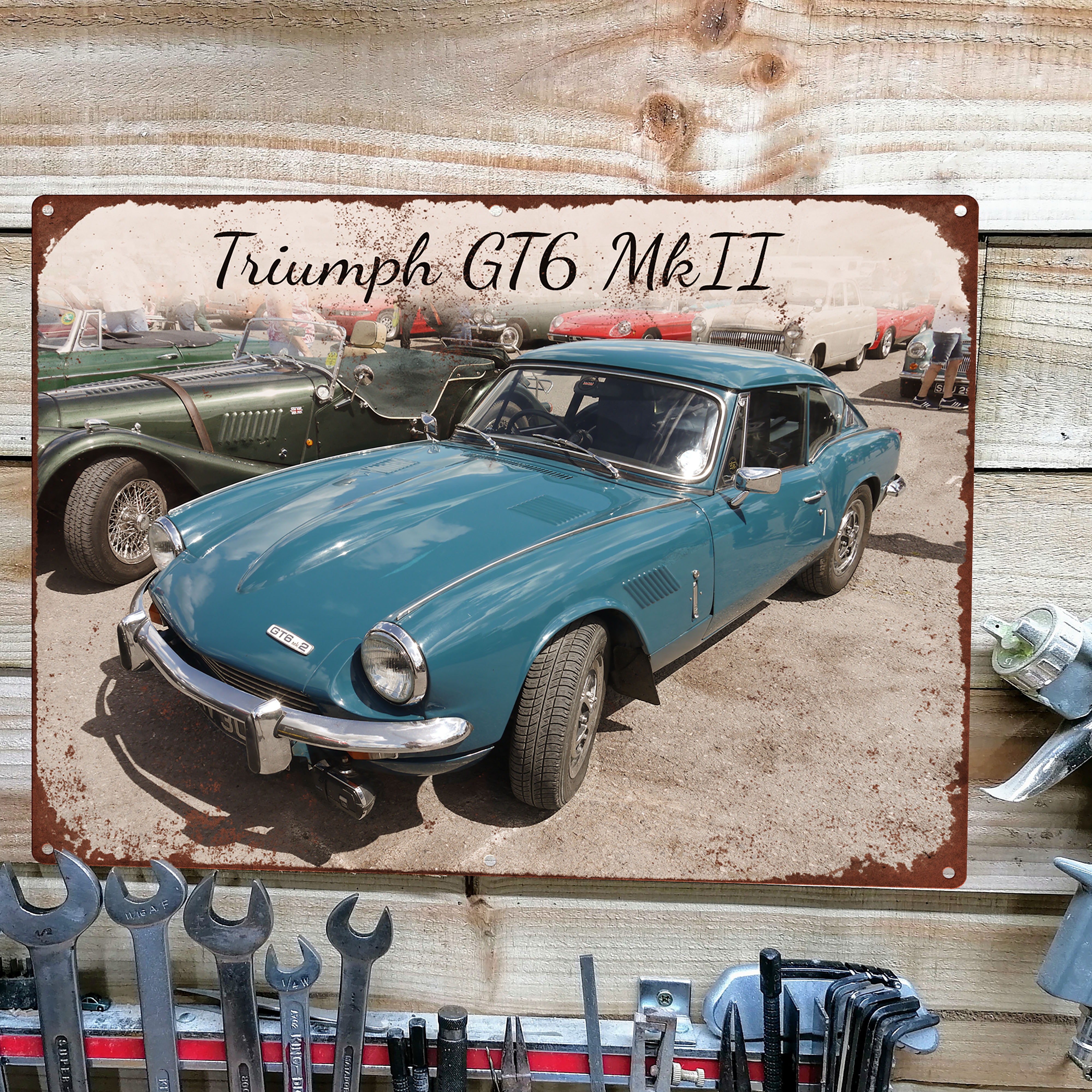 Vintage metal tin sign of car Triumph GT6 Mk2