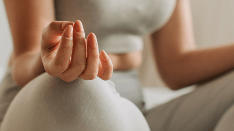 Woman doing meditation by paring it with aromatherapy