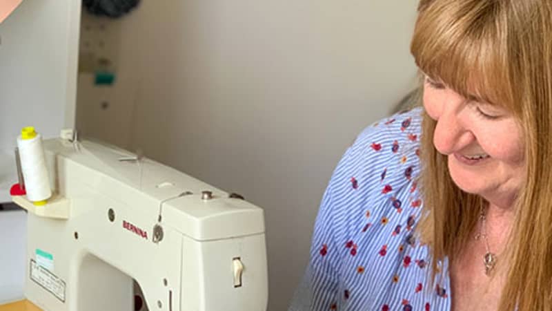 Kate at sewing machine