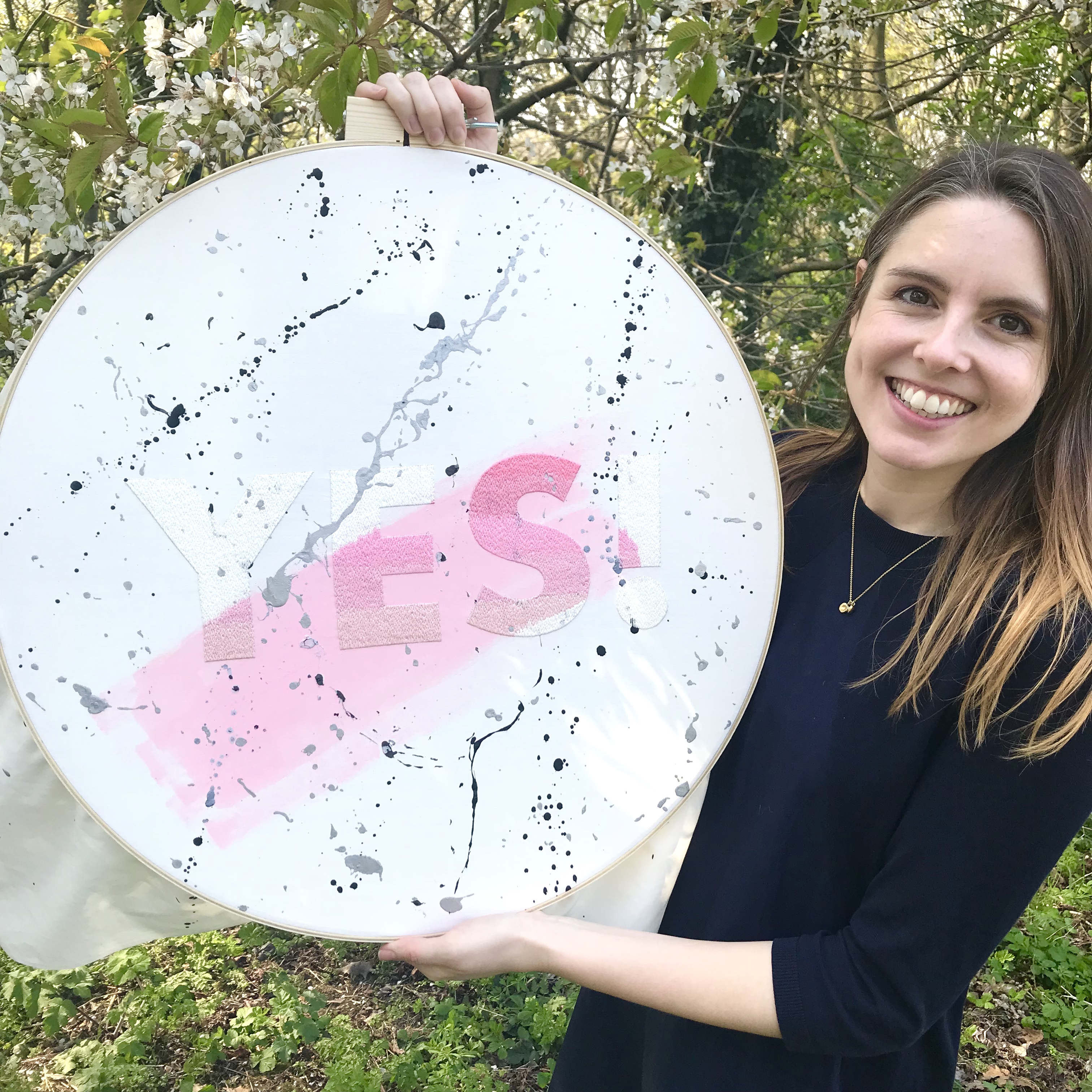 Modern Floss YES! held by maker