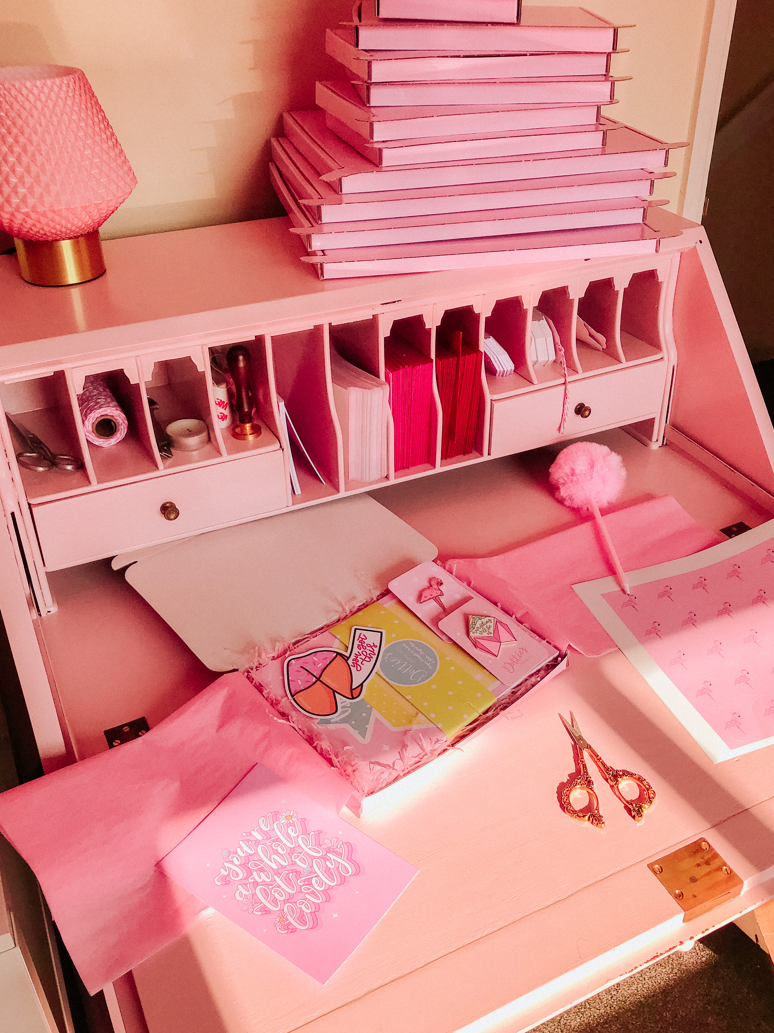 Upcycled vintage bureau used as a packing station