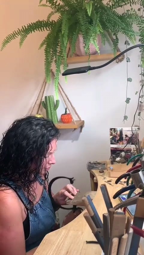 Jeweller at workbench