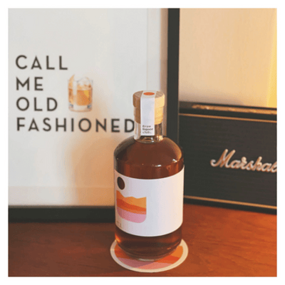 Old Fashioned at home, sitting on coaster in front of Call me Old Fashioned picture.