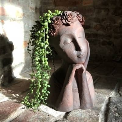 Rusty Girl Bust with Floral Wreath on Head
