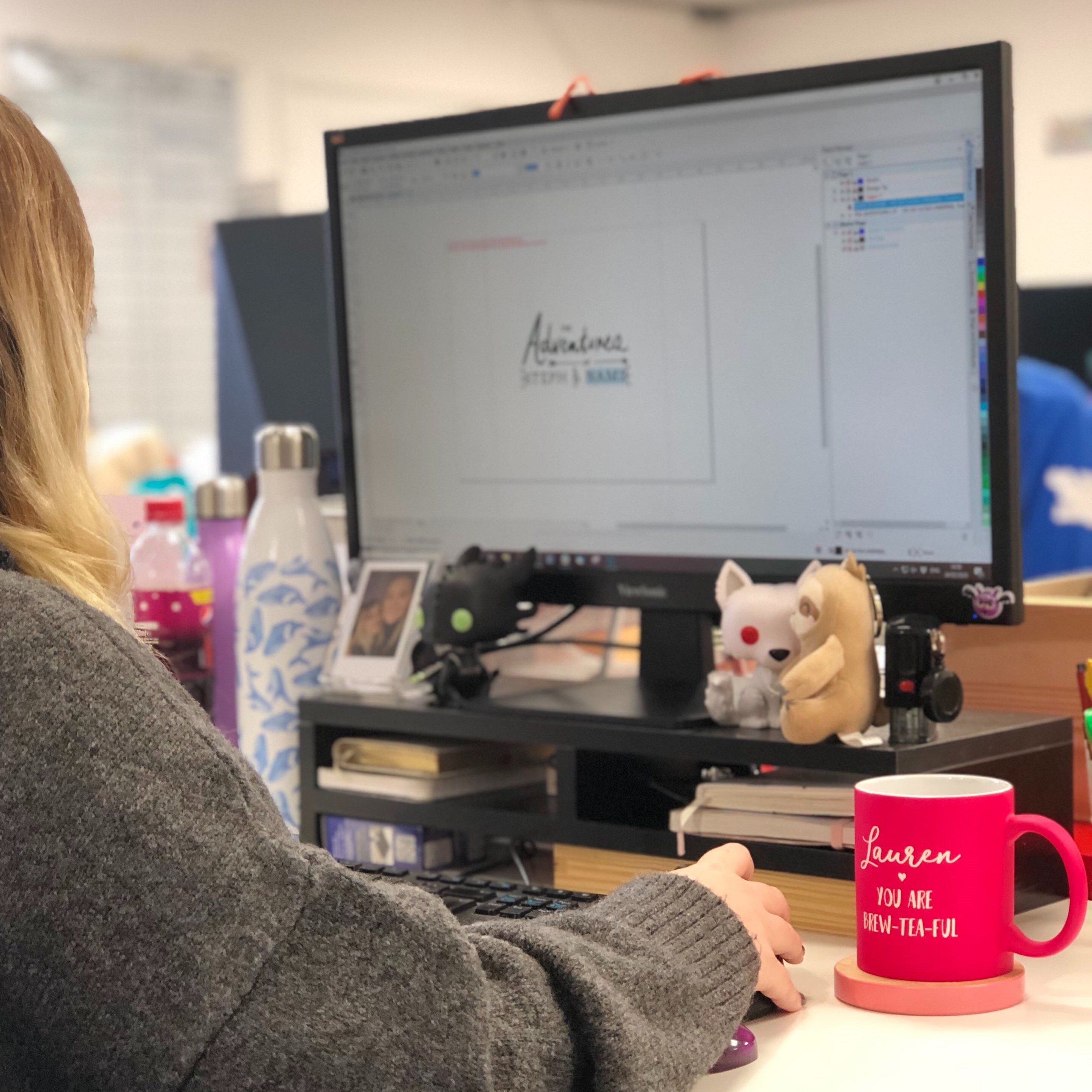 Designer digitally illustrating design