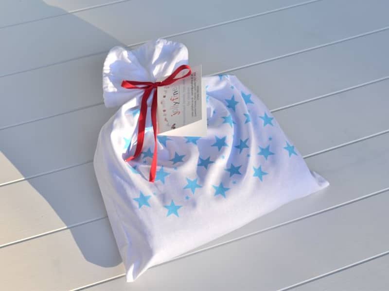 Gift wrap using fun star print fabric bag and hand written gift note
