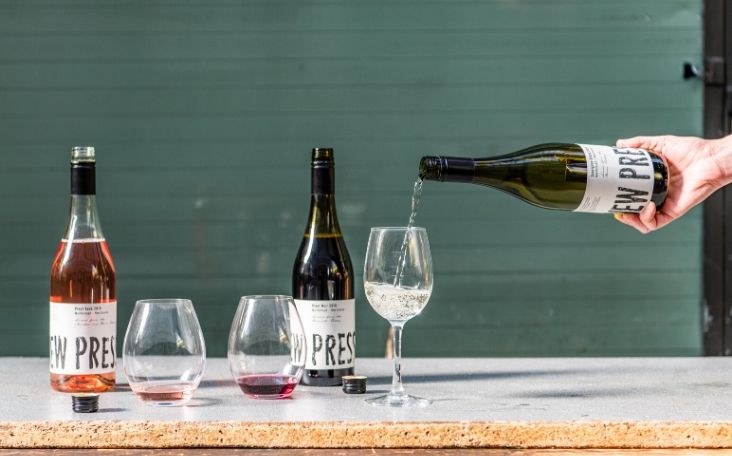 Pouring sauvignon blanc into a glass