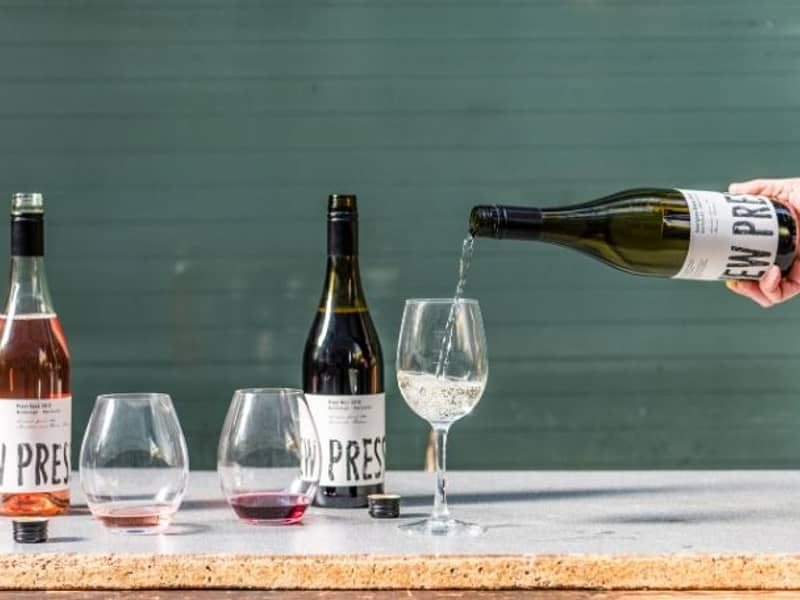 Pouring sauvignon blanc into a glass