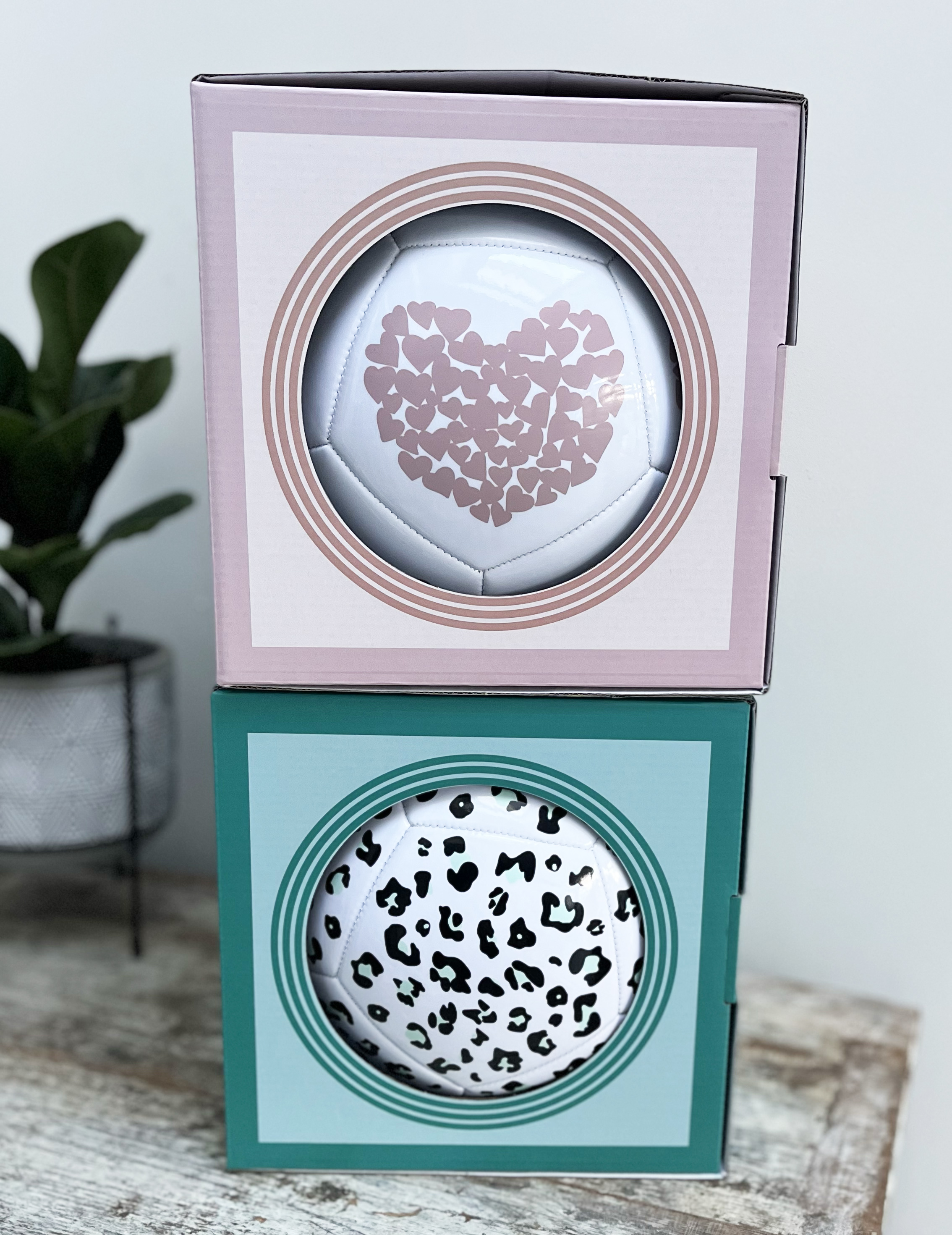 heart and leopard print footballs beautifully encased in a premium gift box