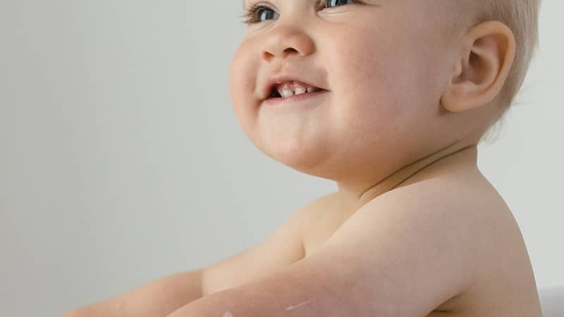 Baby washing in a bath