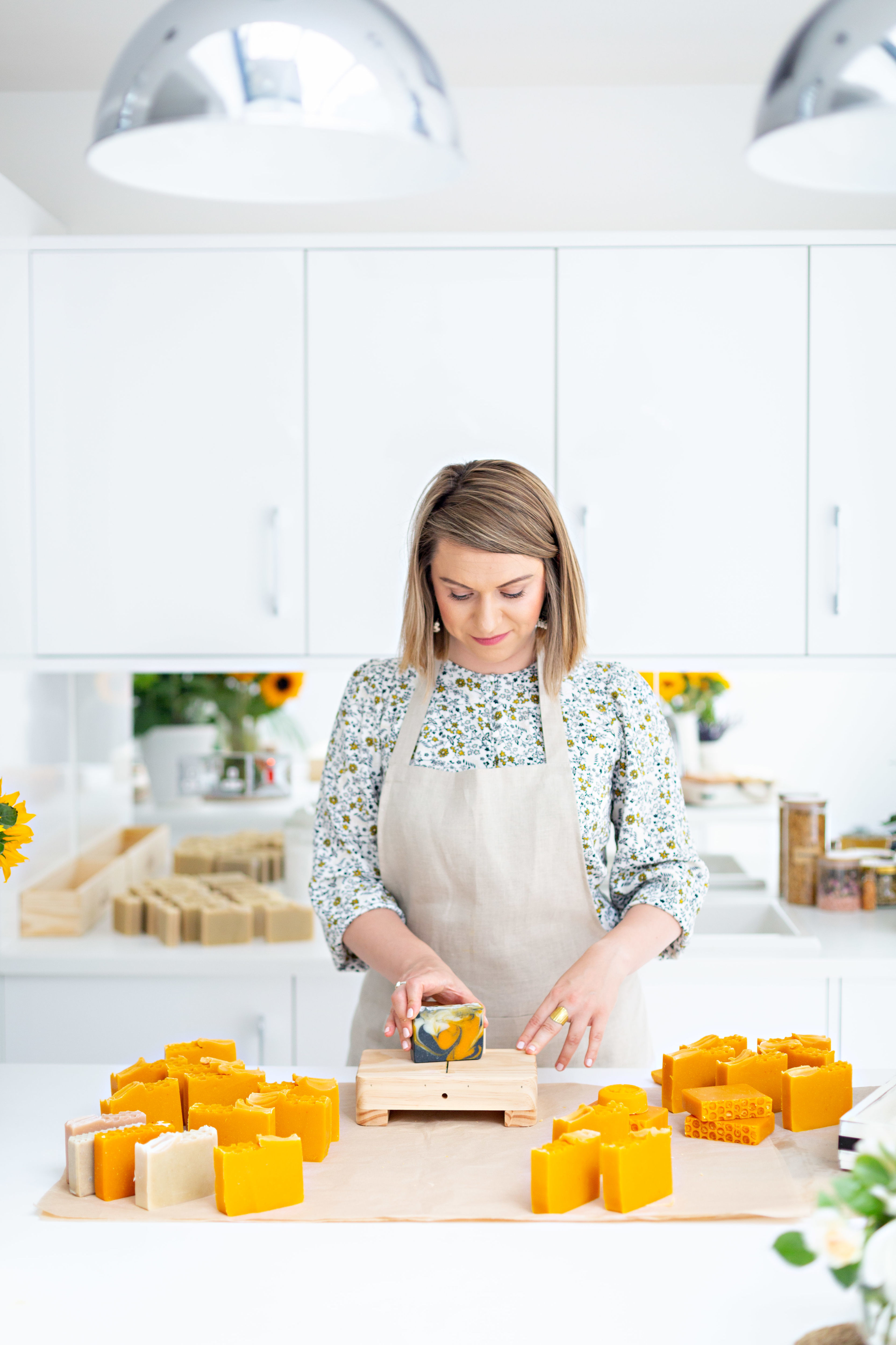 Soapmaker cutting soap