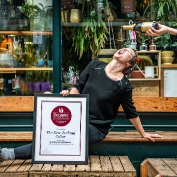 Mel getting champagne poured into her mouth