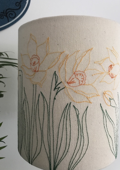 Each lampshade is wrapped in tissue and finished off with a ribbon.