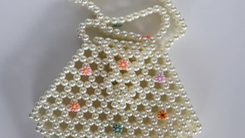 Hexagonal faux pearl bag with colourful flowers