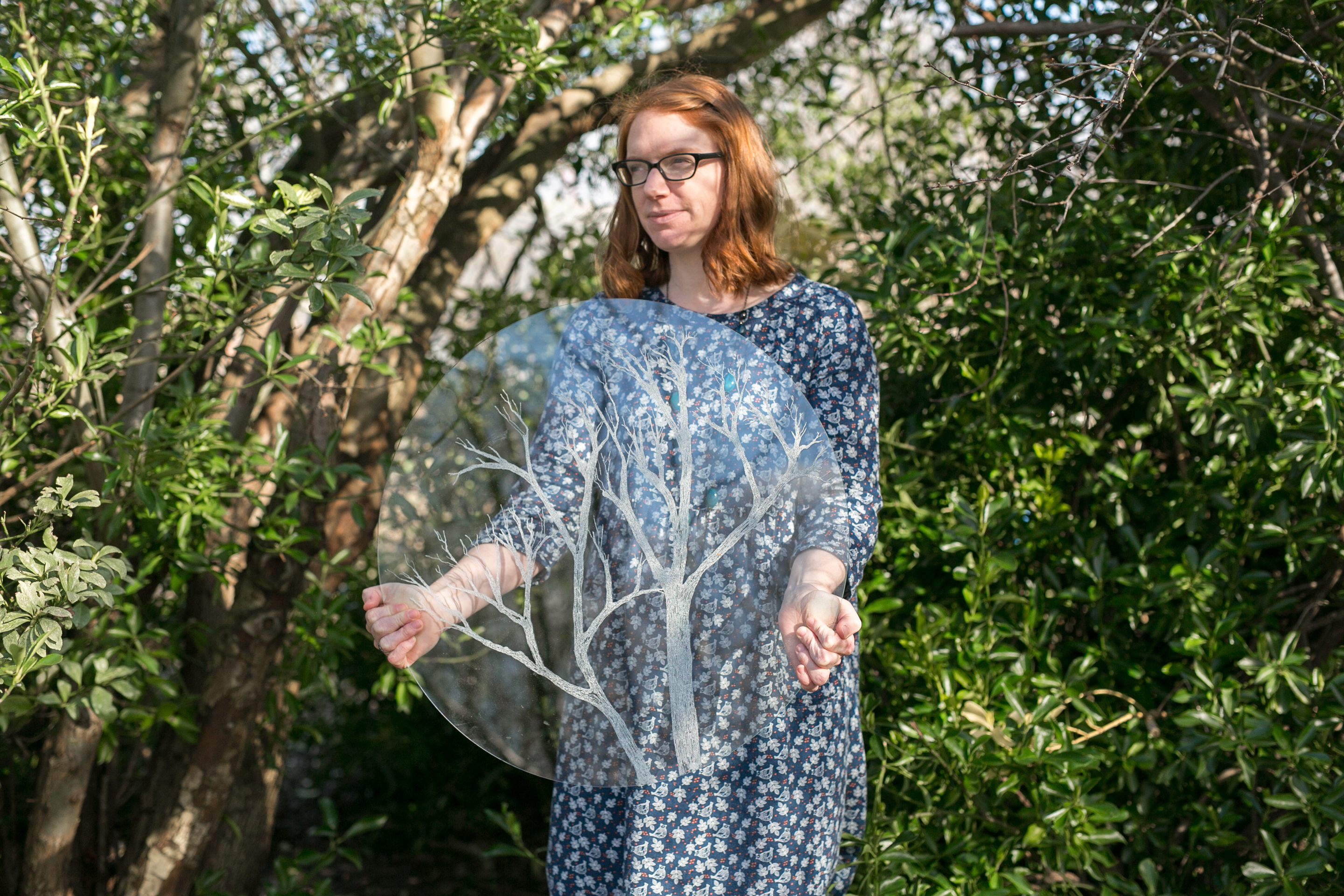 Artist Holding Bespoke engraved glass artwork