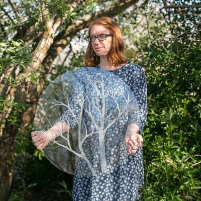 Artist Holding Bespoke engraved glass artwork