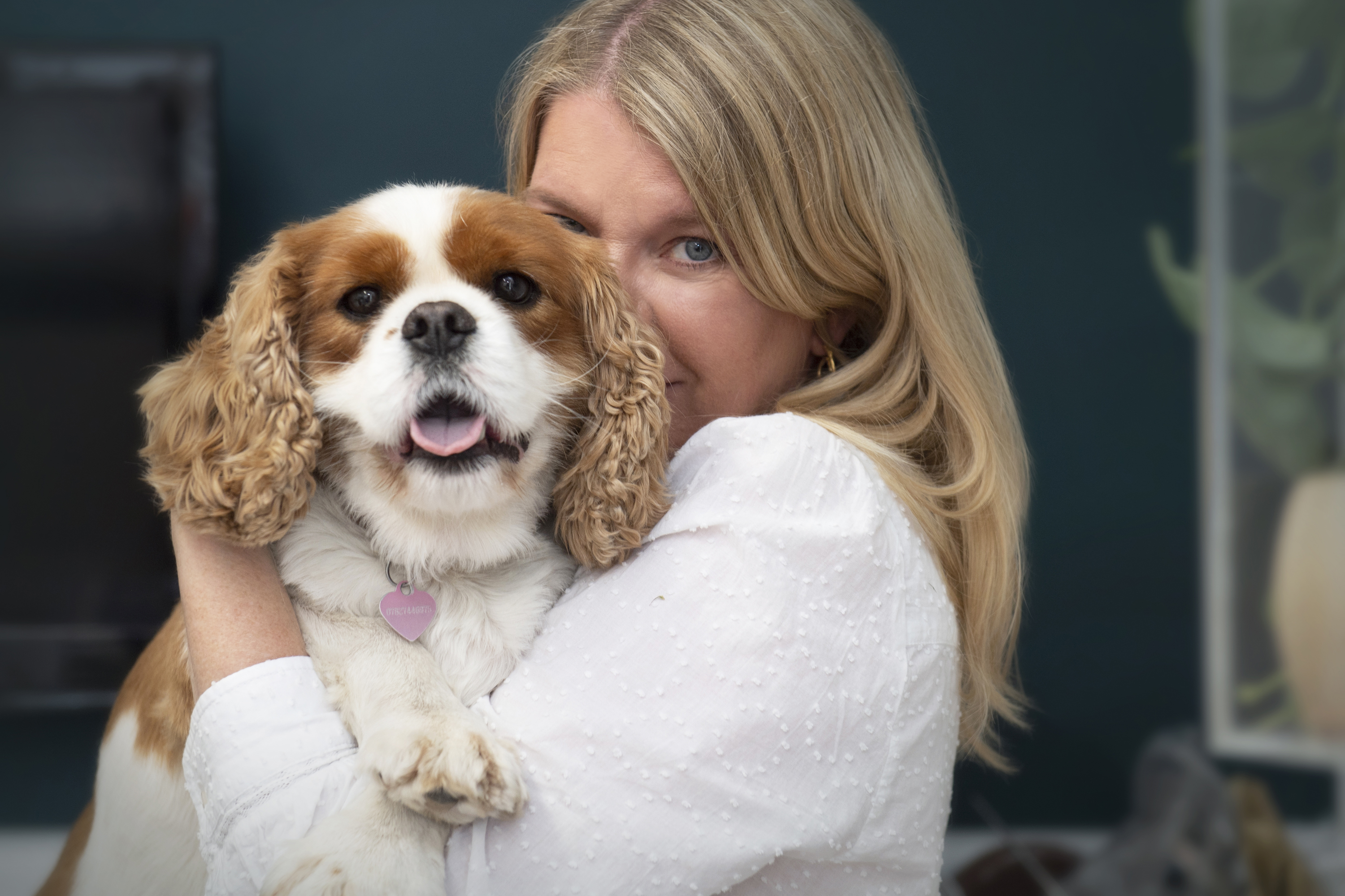 Claire Troughton holding her beloved King Charles Spaniel, Clementine