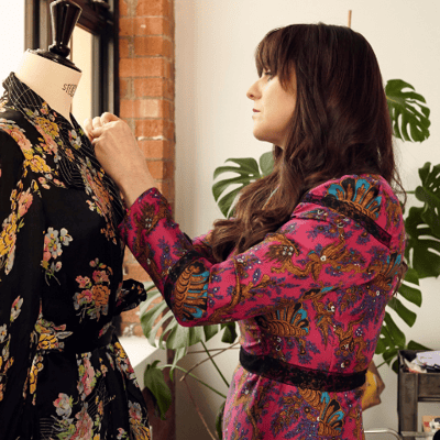 Our founder Paula, measuring a garment
