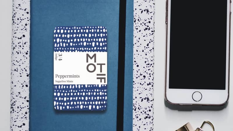 Lifestyle shot of indigo collection tin