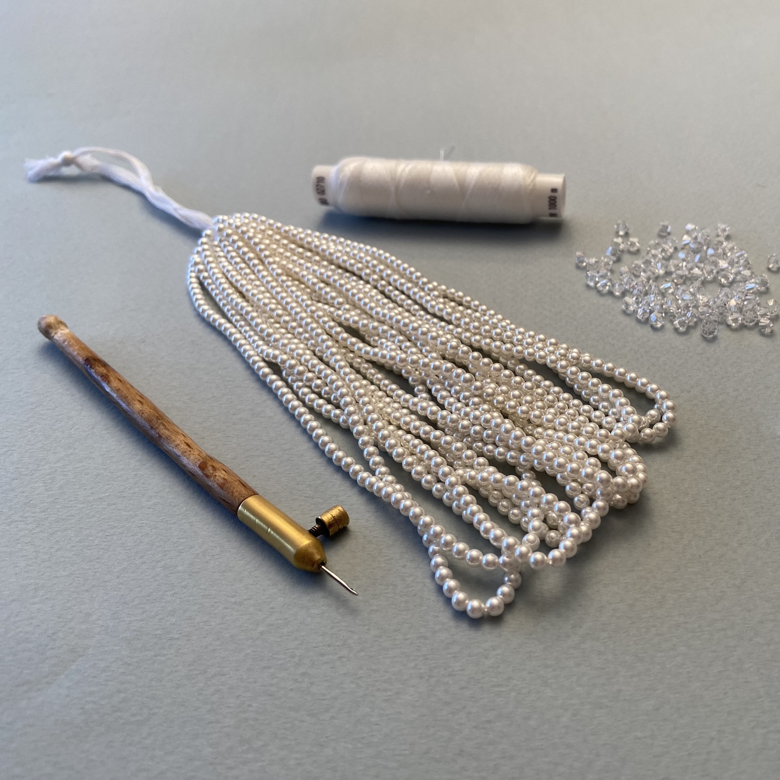 It all starts with a simple tambour hook, thread and beads.....