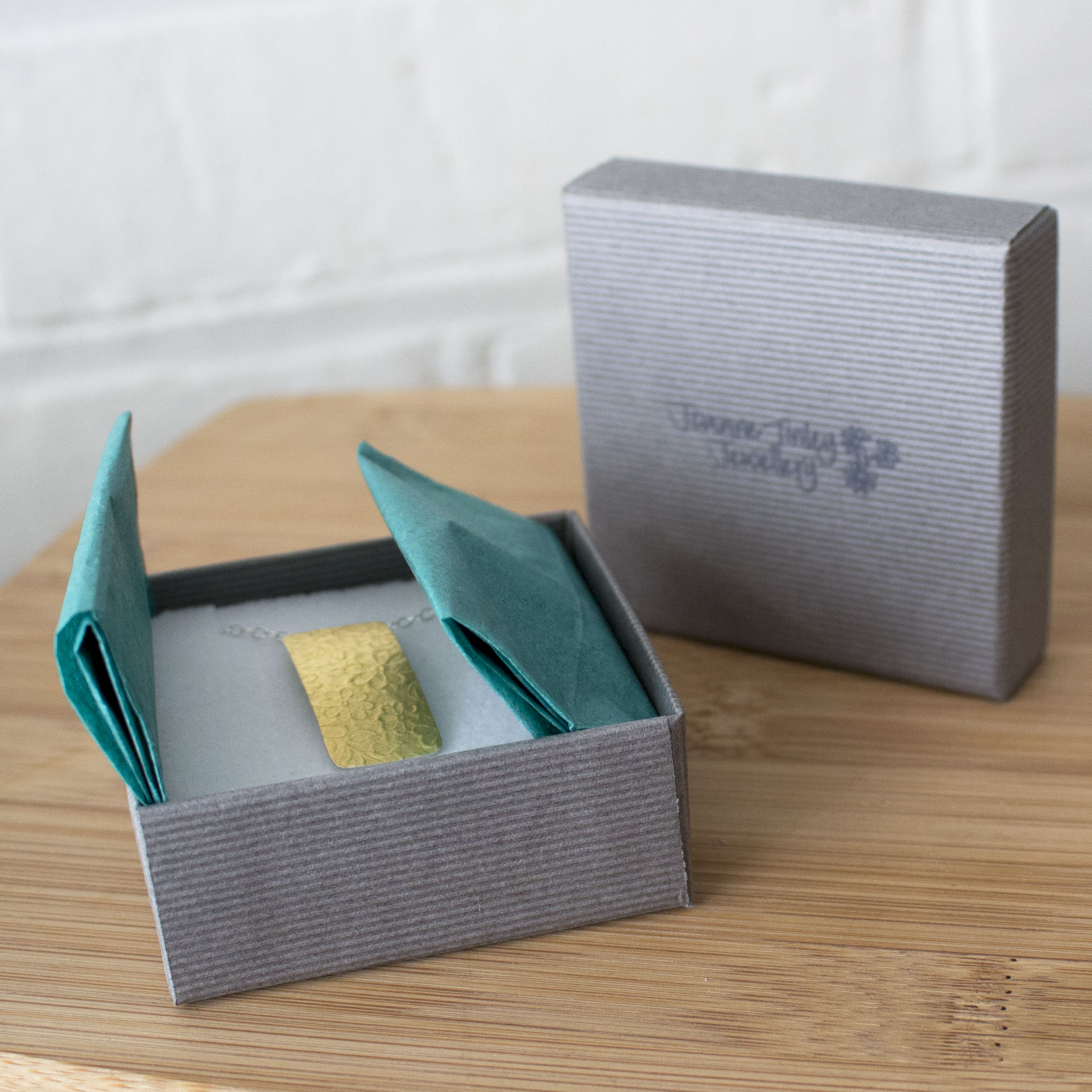 Joanne Tinley Jewellery packaging dove grey boxes
