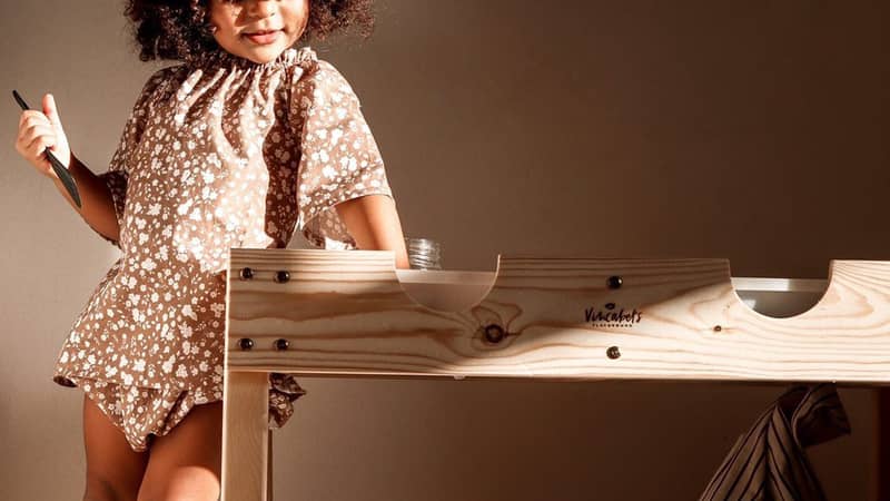 Toddler with sensory table