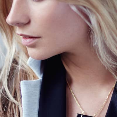 The URBAN BAR NECKLACE features a cool Black Onyx baguette that has been hand-cut to our design specifications and set in 18ct Yellow Gold on Sterling Silver.