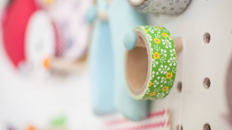 A selection of vibrant felt ball shapes in one of many jars on my shelf!
