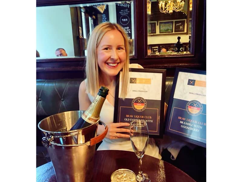 Lizzie celebrating with Scottish Retail Food and Drink Awards