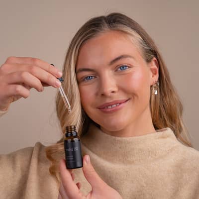 Model showing mëll 22 vegan skincare