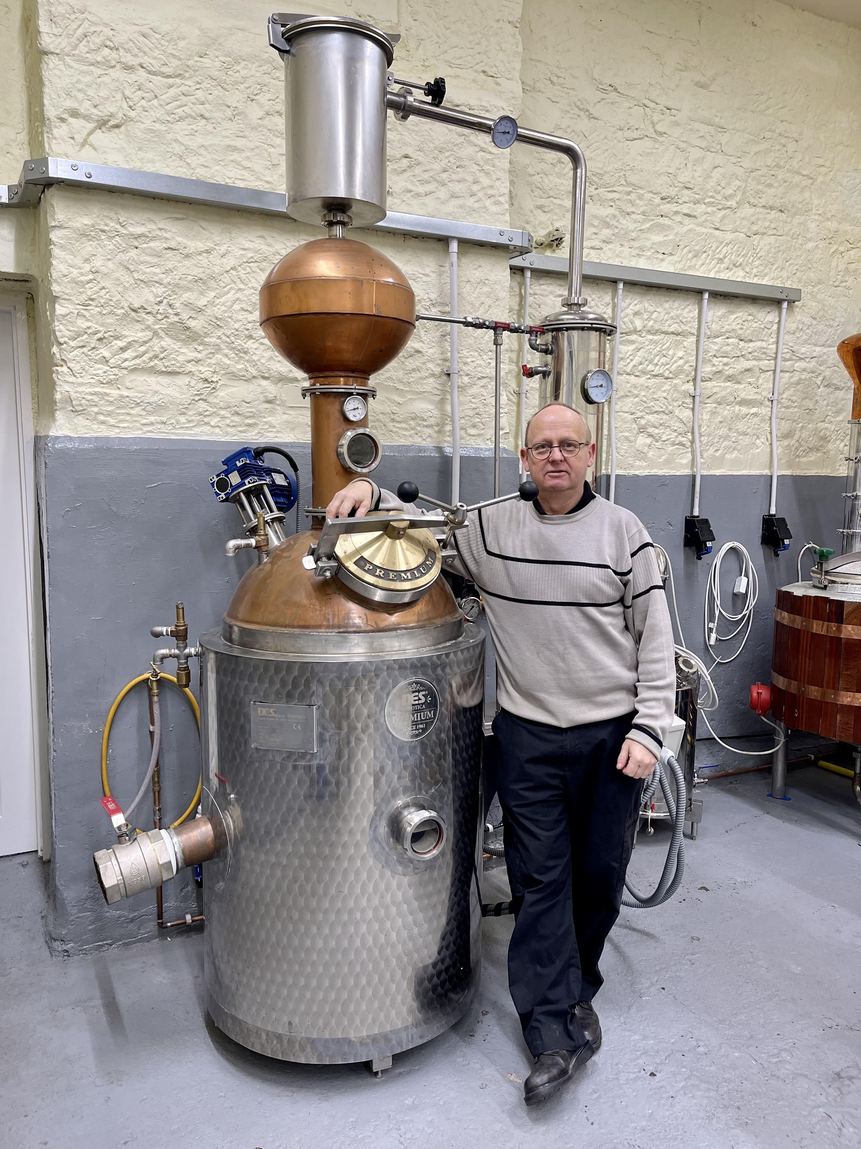 Andrew in the distillery with his latest still