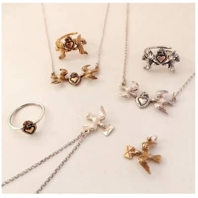 Silver birds and heart necklaces rings