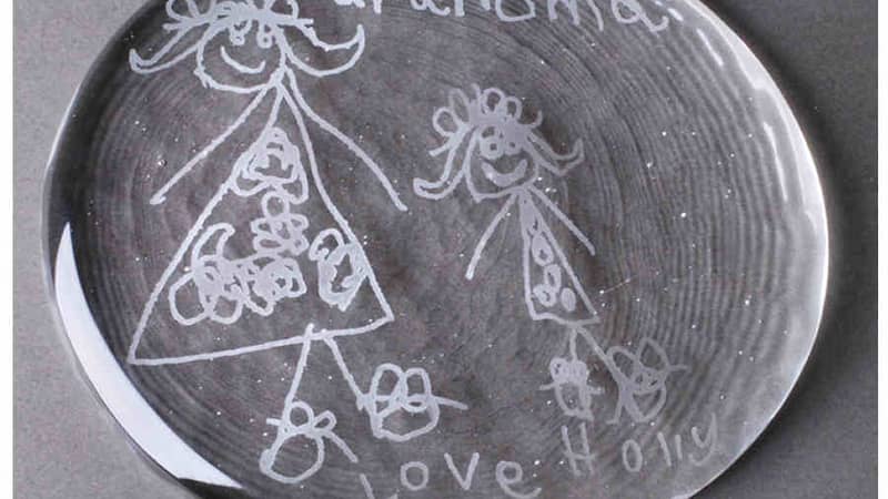 Children's drawing on crystal glass paperweight