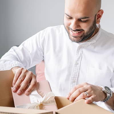 Betterday Studio carefully packing orders