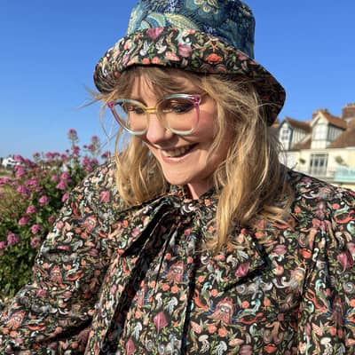 Founder of The Fruit Moth Nicole wearing her Aurelia Blouse in Liberty Neptune's Kingdom