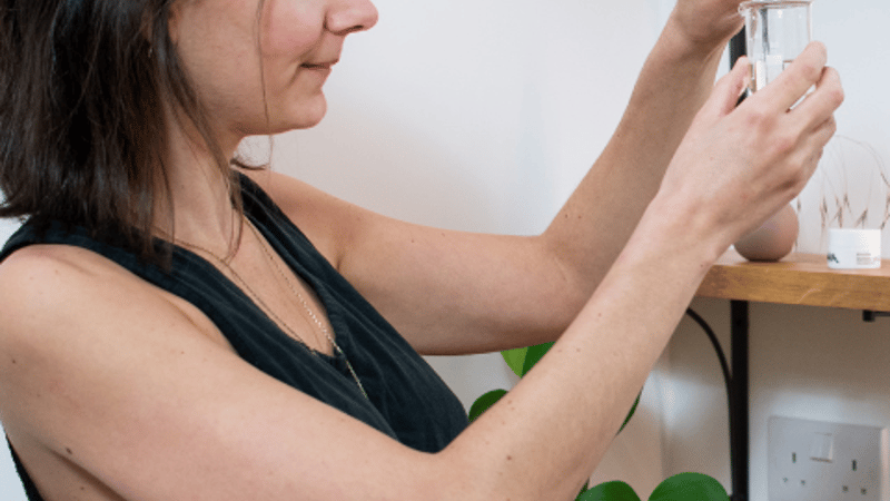 Jennie writing a gift note in aromatherapy studio