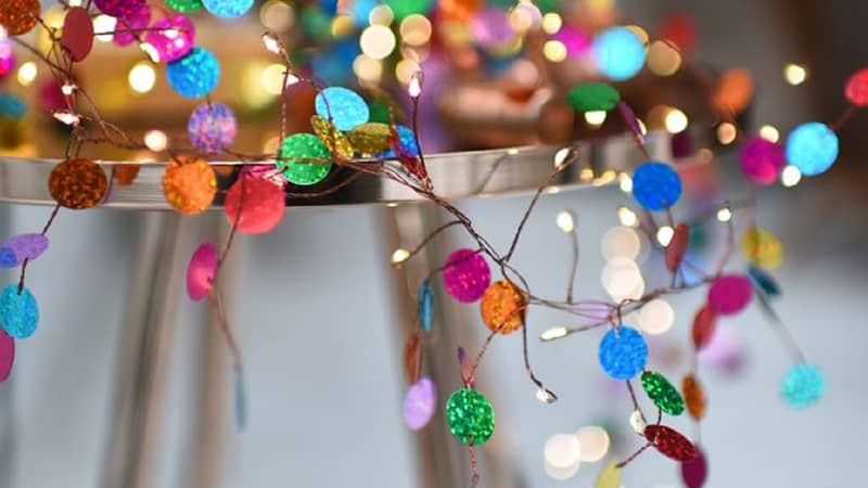 Brightly coloured beaded shimmery battery or mains fairy lights for indoor spaces