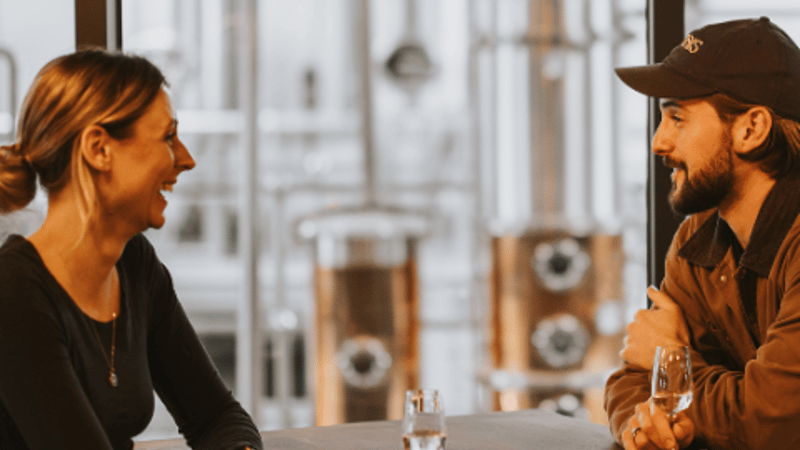 Amy (our co-founder) and a contract client in our Tour & Taste setting.