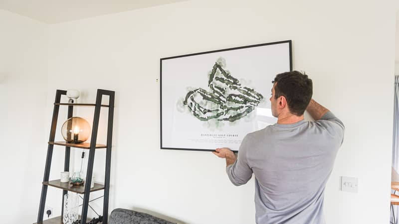 Large black framed golf course map
