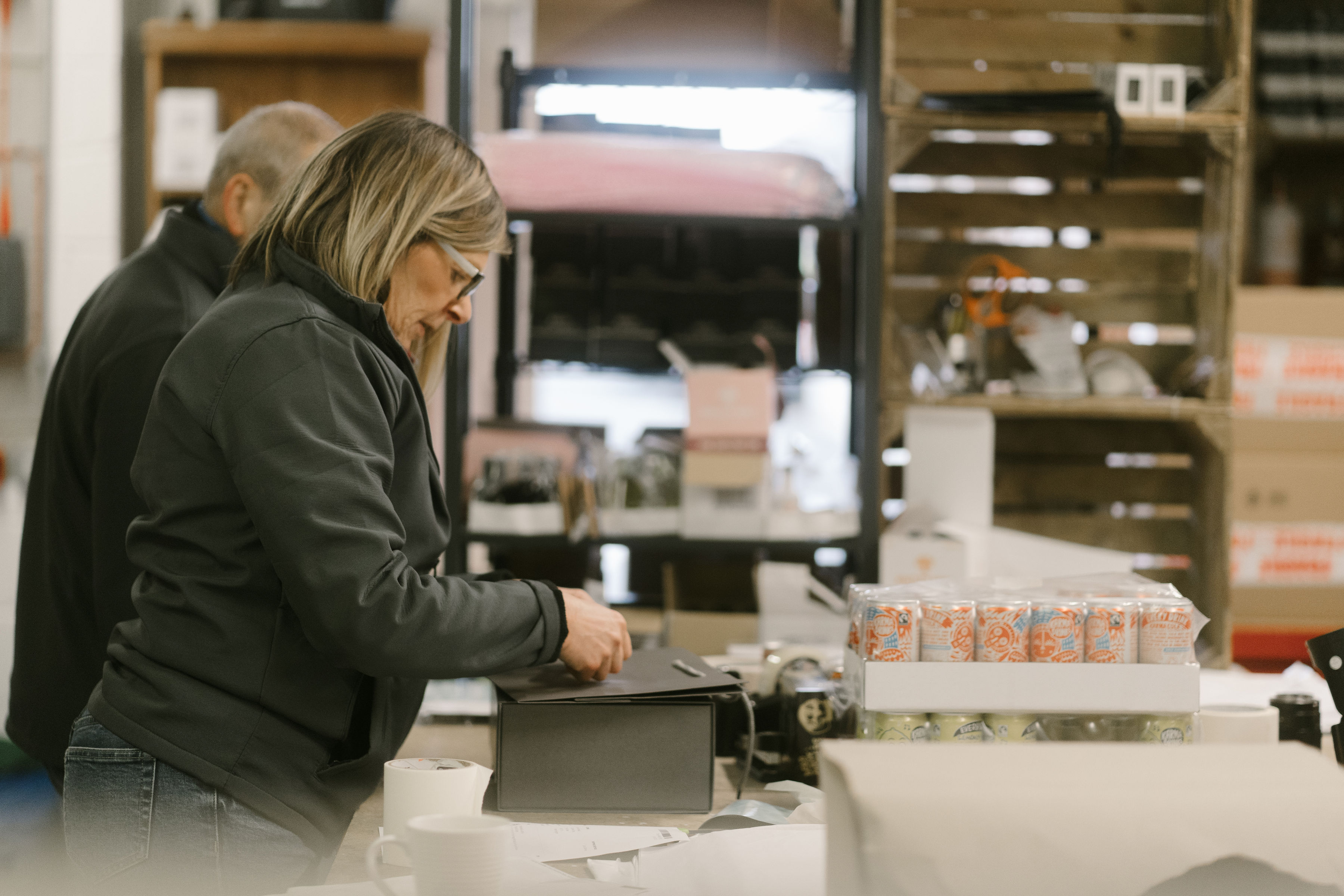 Carefully packaging Gin & Rum Warehouse orders.