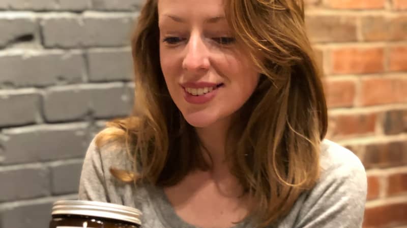 Siân Griffiths wick + wonder founder holding candle