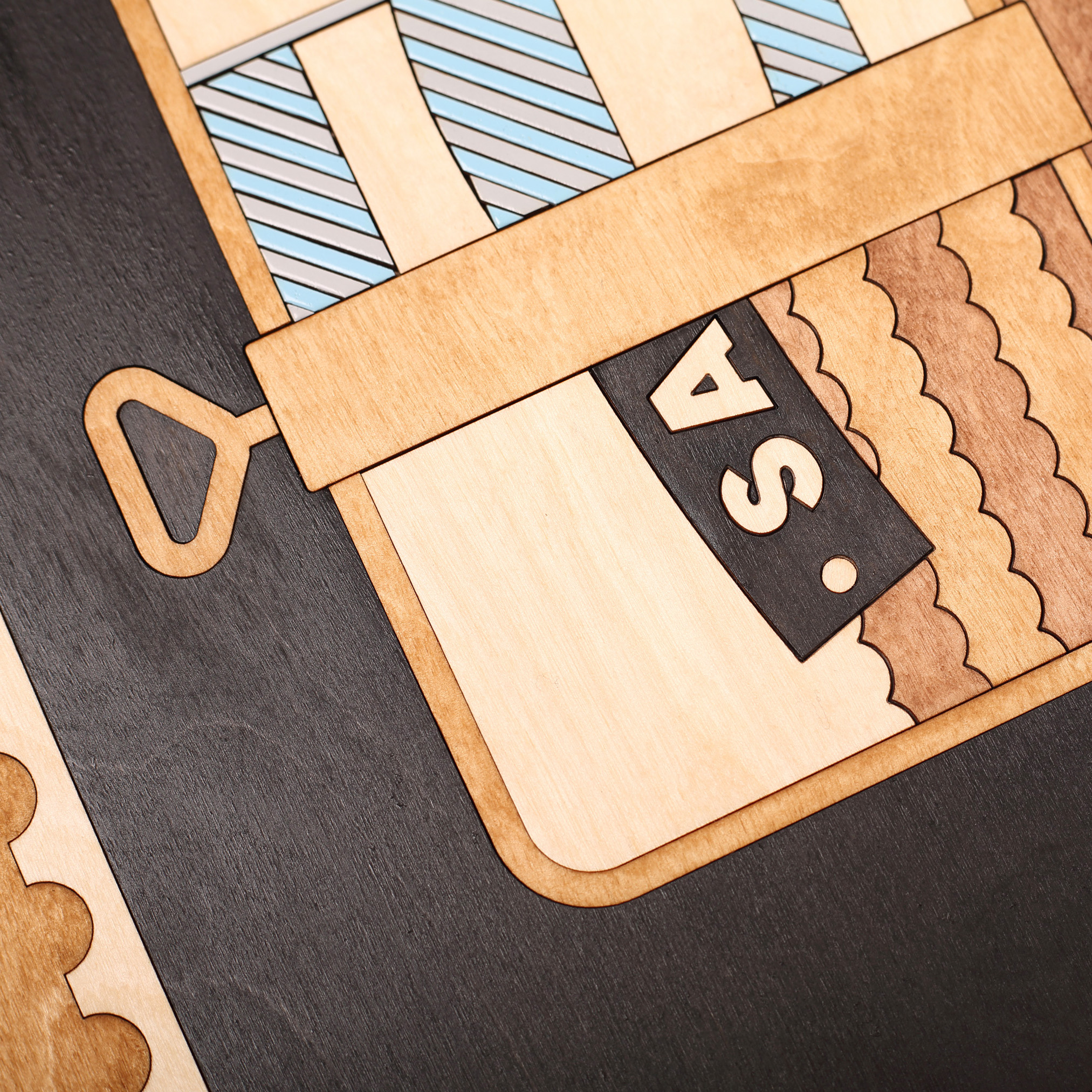 Close up of wooden wall art by snork of inspirational typographic poster inspired by David Bowie’s moorage daydream