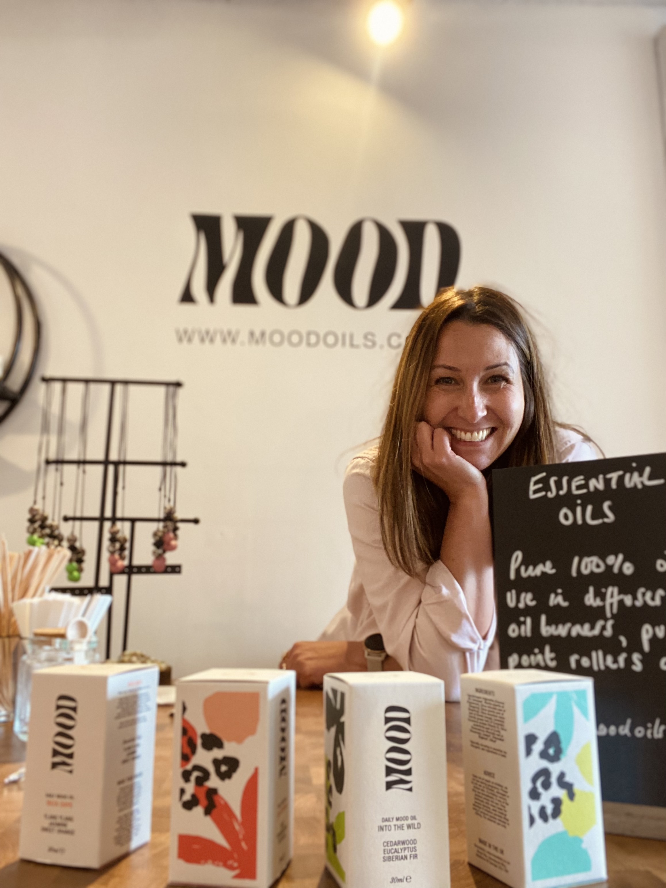 Woman in aromatherapy store front