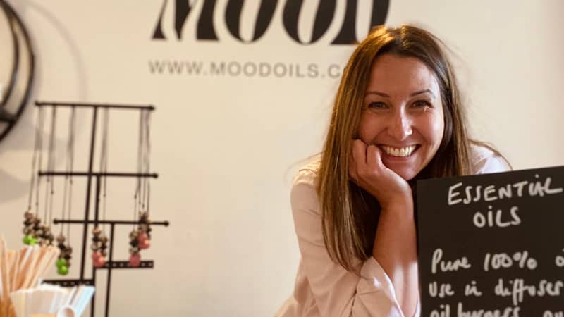 Woman in aromatherapy store front