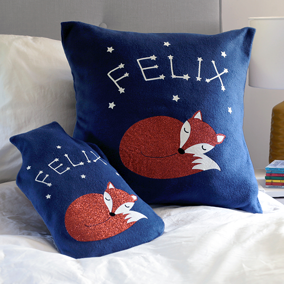 sleeping fox cushion and hot water bottle
