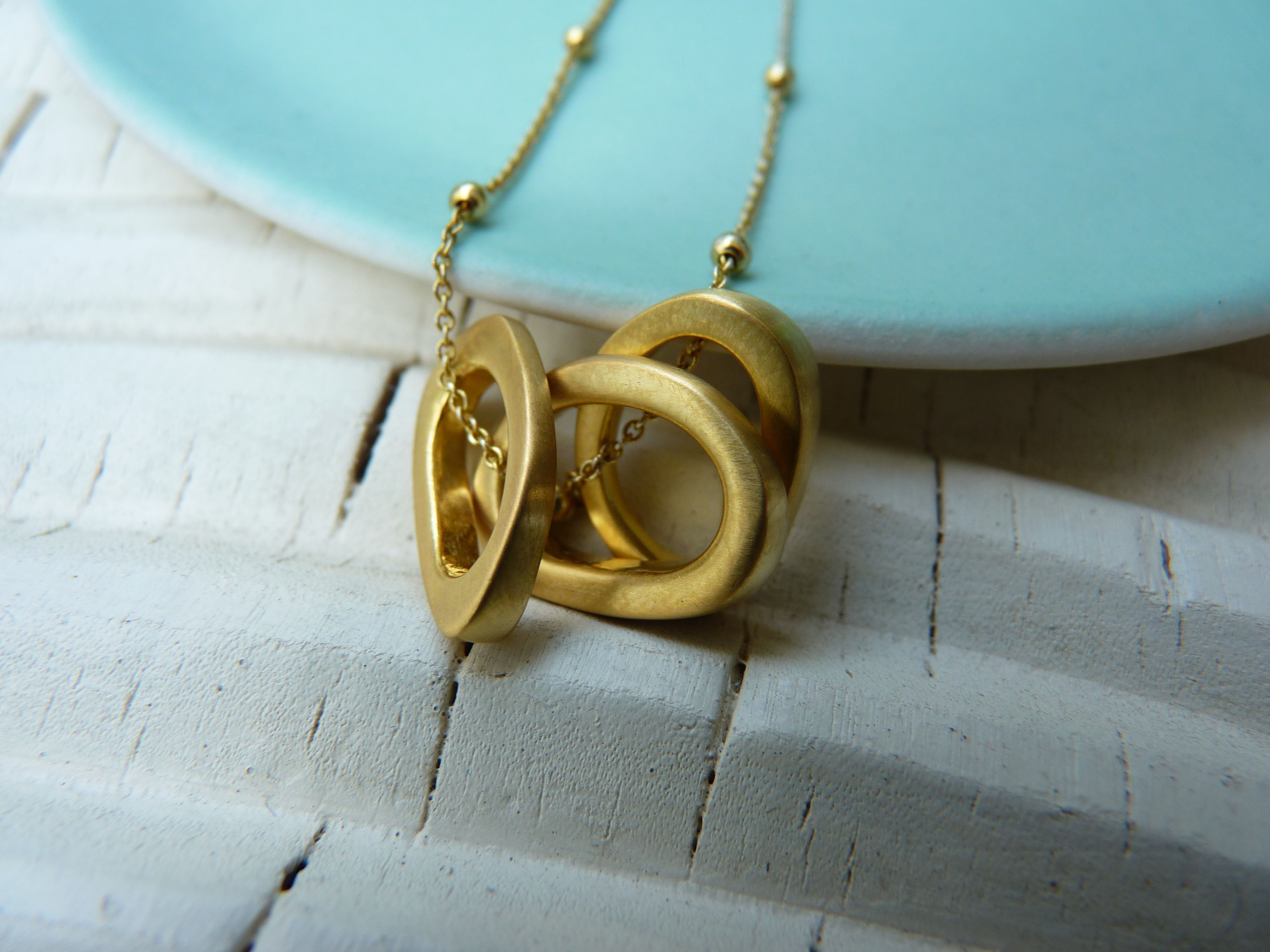 Infinity Three Gold Ovals