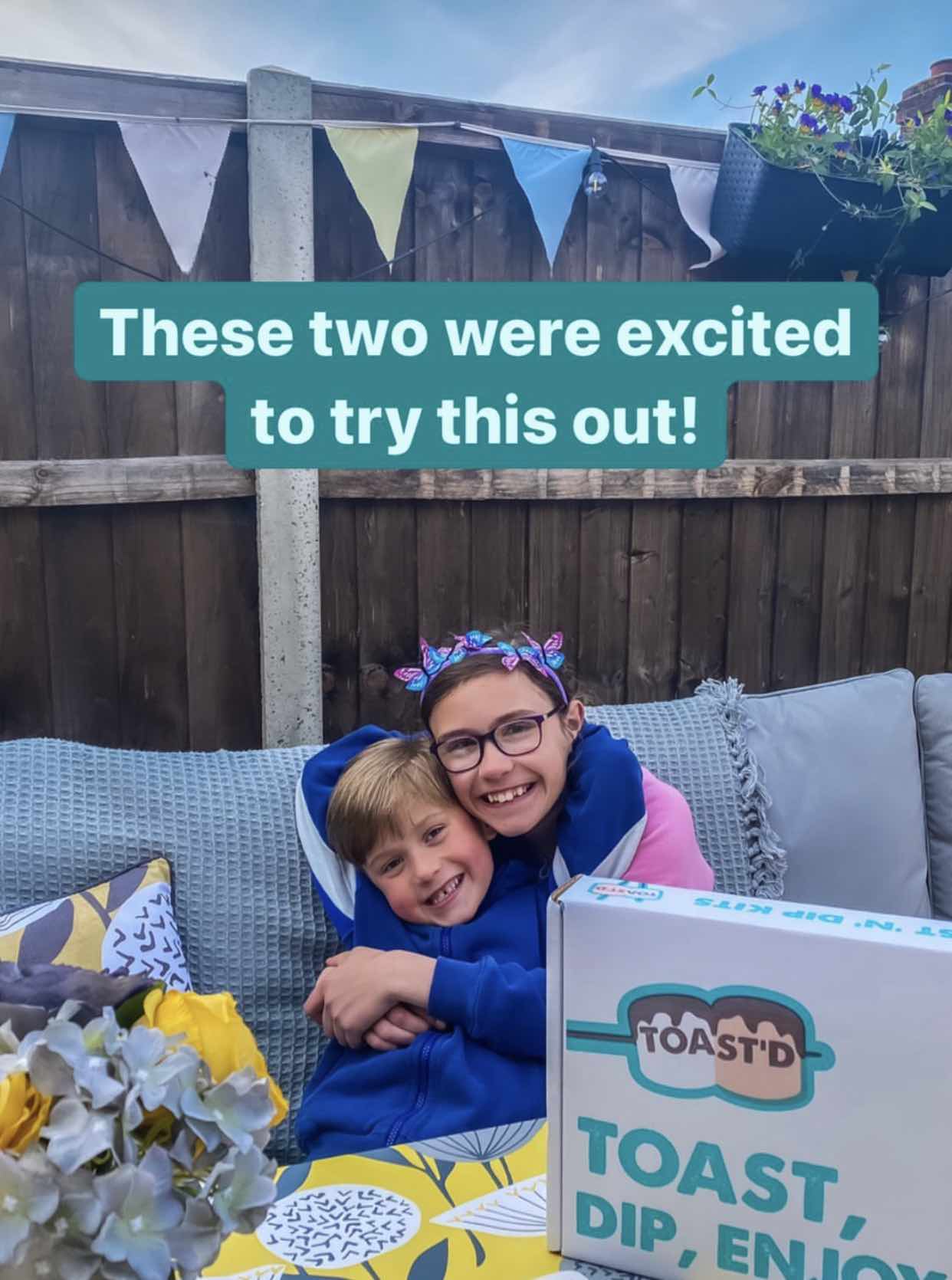 photo of a young girl enjoying toasting marshmallows in the woods