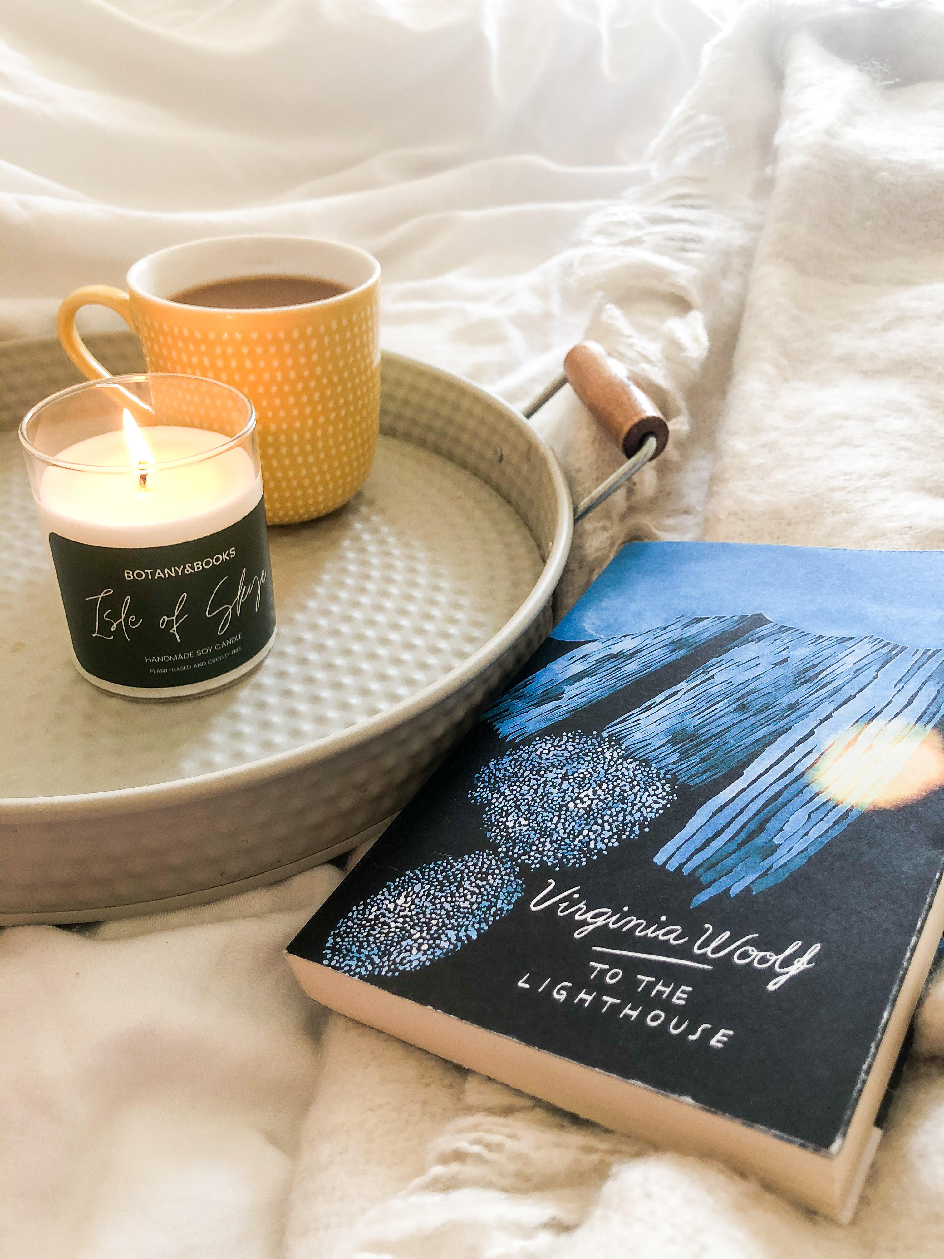 To The Lighthouse with lit Isle of Skye candle. 