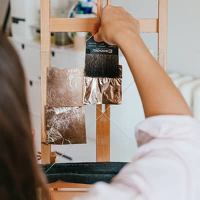 Letters by Em, work in progress water gilding with gold leaf